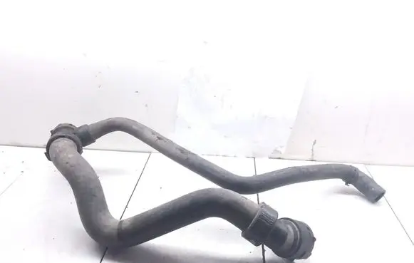 Volkswagen PASSAT B5 Engine coolant pipe/hose 4B0121049S