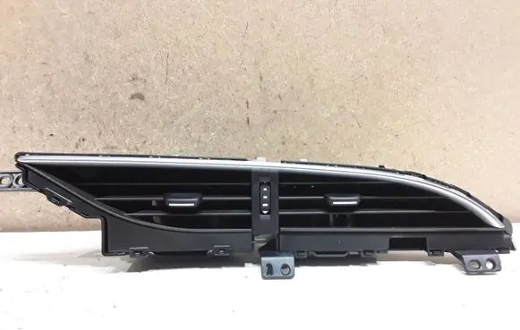 Toyota Yaris Dash center air vent grill 556700D240