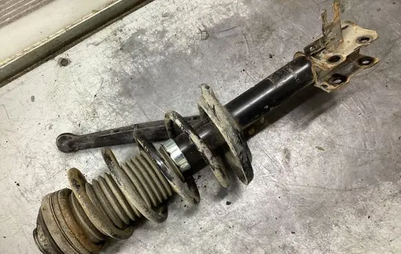 Opel Astra H Front shock absorber with coil spring