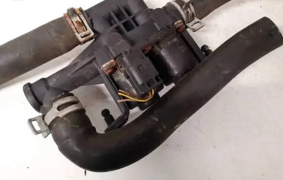 Coolant heater control valve