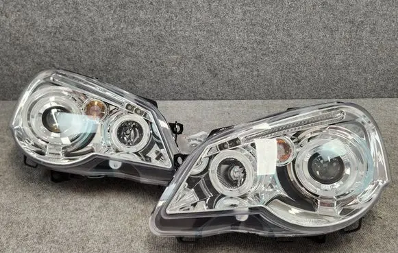 Volkswagen Polo IV 9N3 Headlights/headlamps set HU215HBSCZ HU215HB