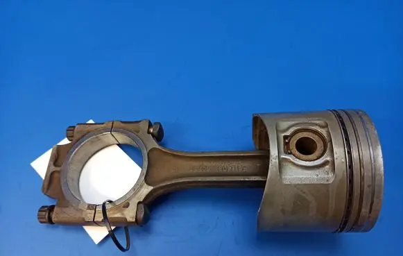 Piston with connecting rod