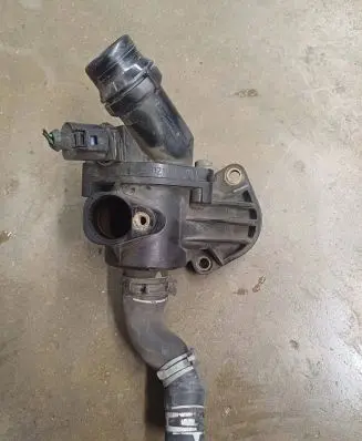 Thermostat/thermostat housing
