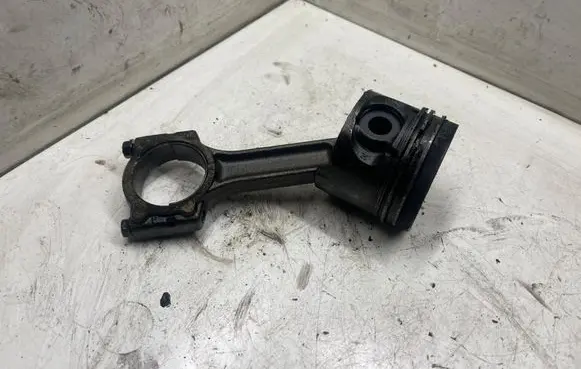 Piston with connecting rod