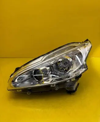 Peugeot 208 I Headlight/headlamp 9802221480