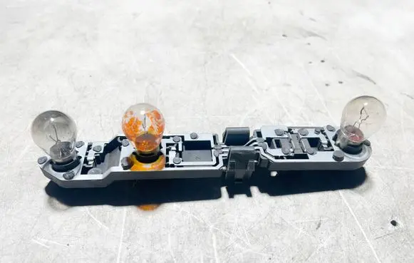 Volvo S60 Tail light bulb cover holder 153852
