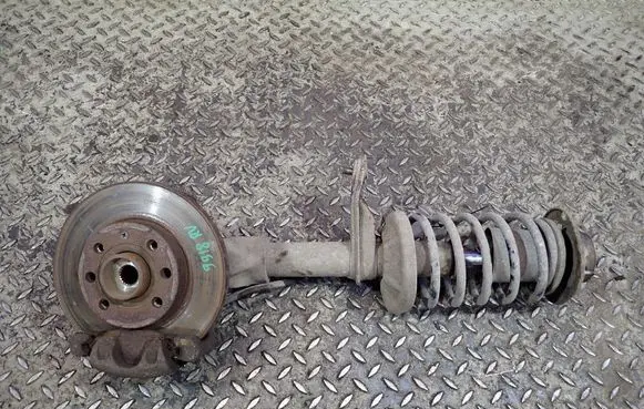 Chevrolet Lanos Front shock absorber with coil spring 