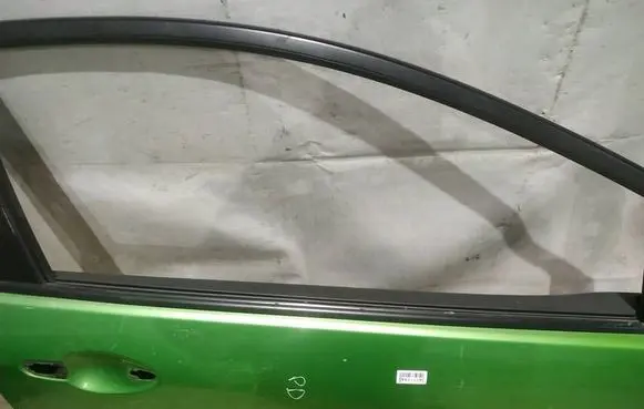 Mazda 2 Front door glass trim molding 