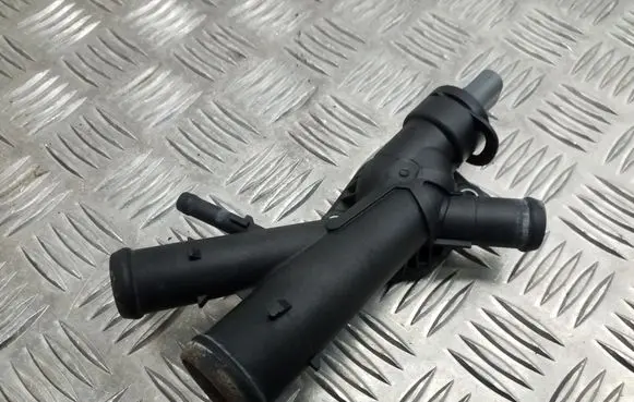 Skoda Superb B6 (3T) Engine coolant pipe/hose 03L121131AA