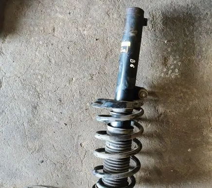 Volkswagen PASSAT B6 Front shock absorber with coil spring