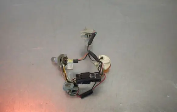 Hyundai Tucson JM Tail light bulb cover holder