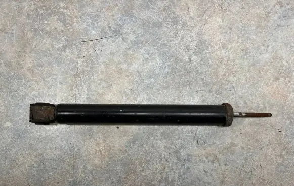 Nissan Note (E11) Front shock absorber/damper 562009U00A 06092914 03071000648