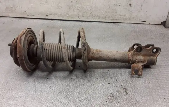 Nissan X-Trail T30 Front shock absorber with coil spring 