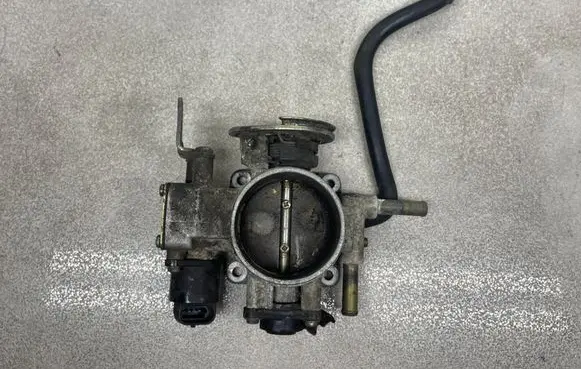 Opel Frontera B Throttle valve 9430060027