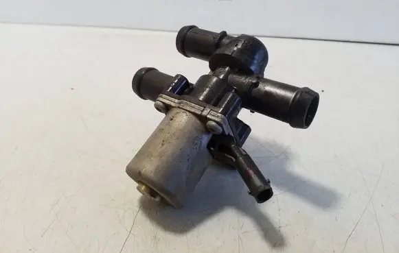 Coolant heater control valve