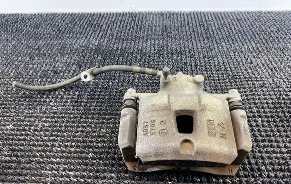 Subaru Impreza IV Front brake caliper 
