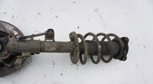 Hyundai Tucson TL Front shock absorber with coil spring MCPERSON