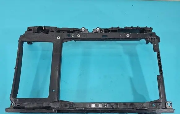 Radiator support slam panel