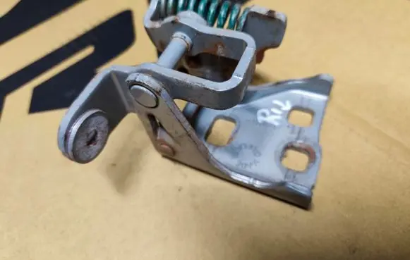 Front door lower hinge