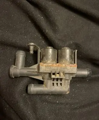 Coolant heater control valve