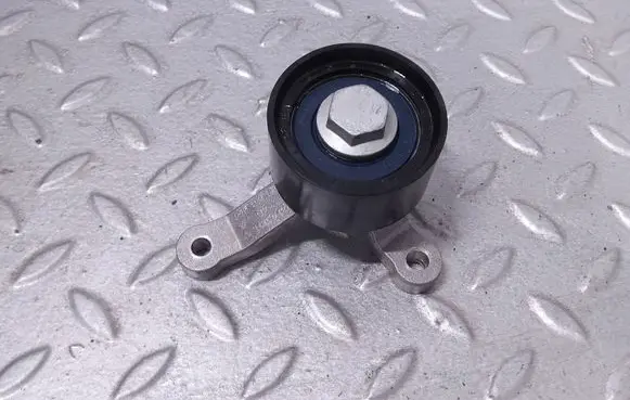 Timing belt tensioner pulley