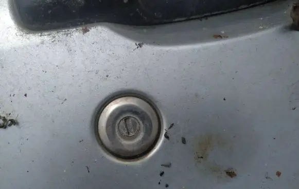 Subaru Forester SF Front door lock (next to the handle) 
