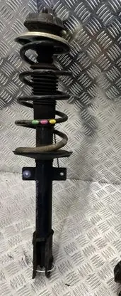 Dacia Duster II Front shock absorber with coil spring