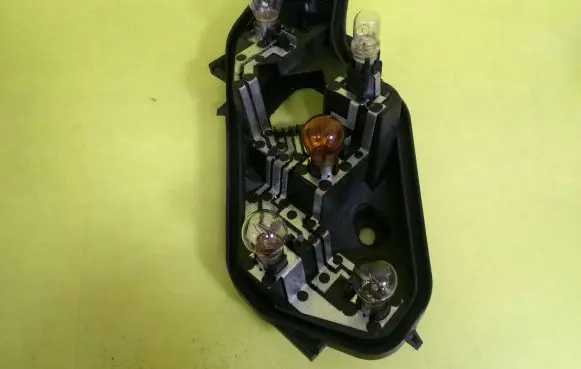 Opel Corsa D Tail light bulb cover holder