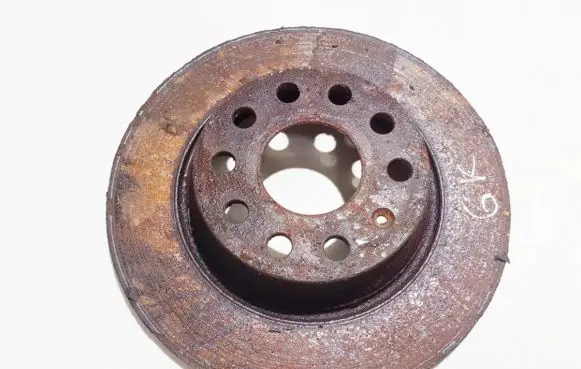 Volkswagen PASSAT B6 Rear brake disc neventiliuojamas