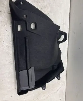 Volkswagen Golf VII Trunk/boot side trim panel