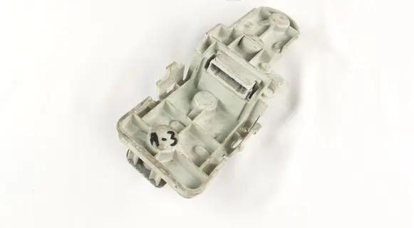 Tail light bulb cover holder