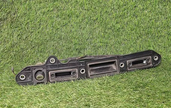 Volkswagen Jetta V Trunk door license plate light bar 1T0827574D