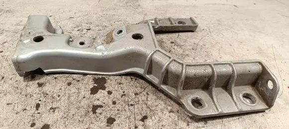 Jaguar XE Radiator mount bracket GX7317K899AD