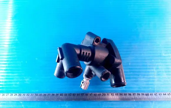 Thermostat/thermostat housing
