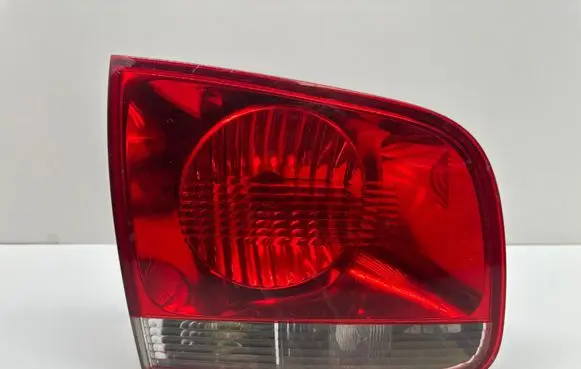 Volkswagen Touareg I Tailgate rear/tail lights 7L6945093J