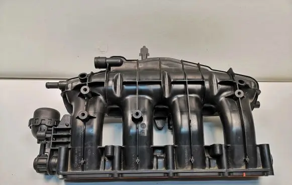 Volkswagen PASSAT B7 Intake manifold 06J133185ES
