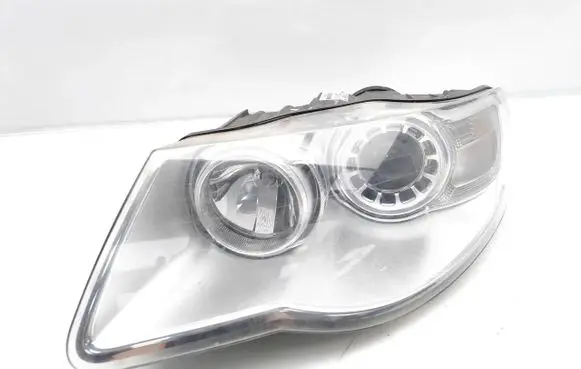Volkswagen Touareg I Headlight/headlamp 7L6941031