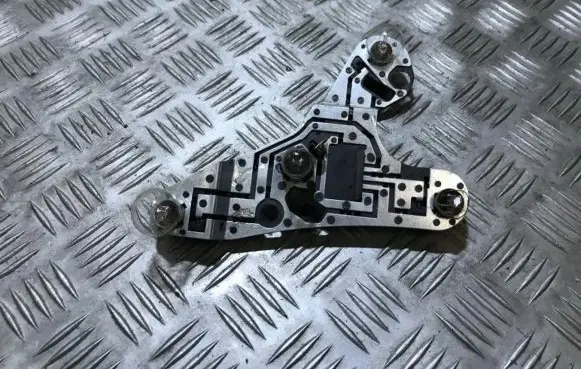 Tail light bulb cover holder