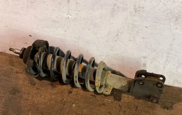 Front shock absorber with coil spring