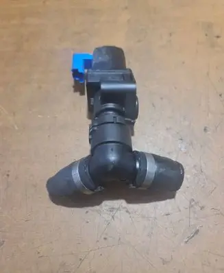 Coolant heater control valve