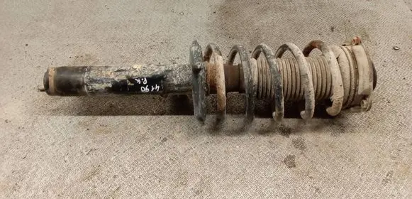 Volkswagen Caddy Front shock absorber with coil spring 