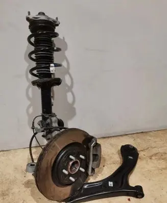 Front wheel hub spindle knuckle