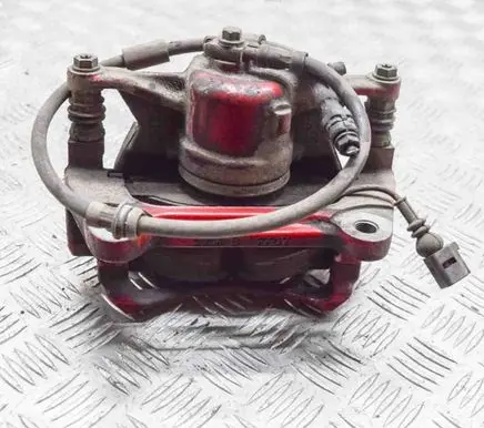 Volkswagen Golf VII Front brake caliper