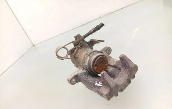 Volkswagen PASSAT B5 Rear brake caliper 