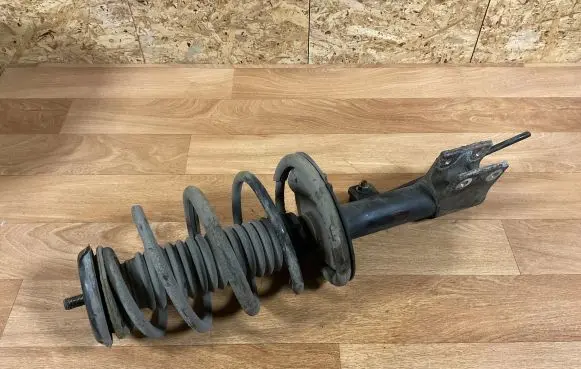 Citroen C4 I Front shock absorber with coil spring