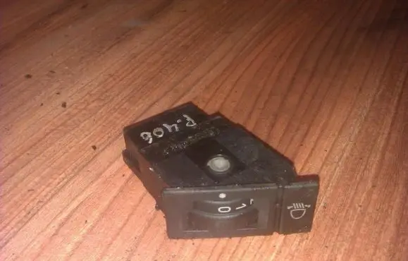 Headlight level height control switch
