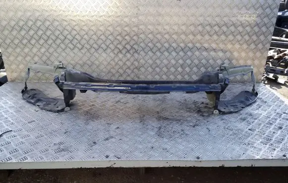 Top upper radiator support slam panel