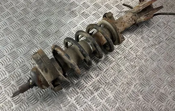 Front shock absorber with coil spring