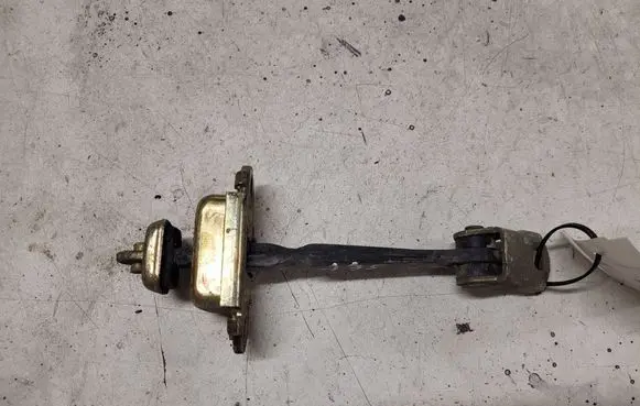 Nissan Primera Front door check strap stopper