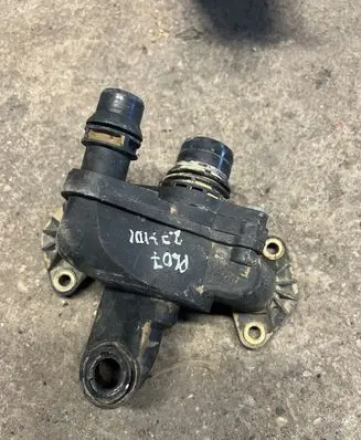 Thermostat/thermostat housing